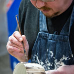 Richard Heeley at work in his pottery in Shropshire Feb 2018